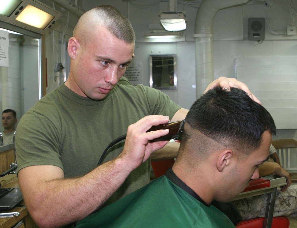 22nd MEU Marines work aboard USS Bataan