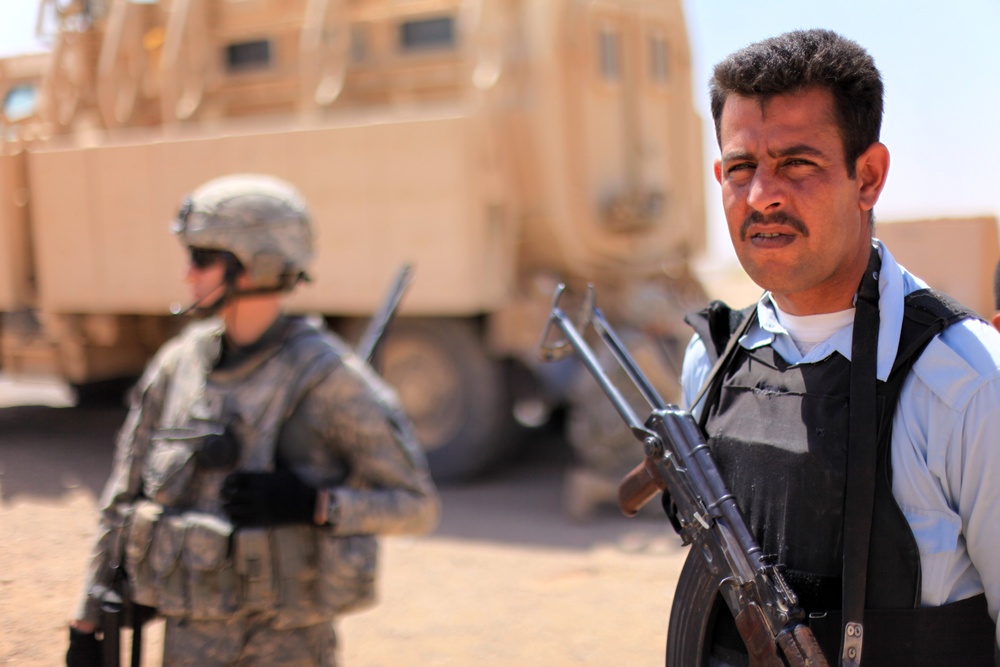 Iraqi Police Patrol With U.S. in Kirkuk