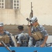 U.S., Iraqi policemen patrol outside Forward Operating Base Falcon