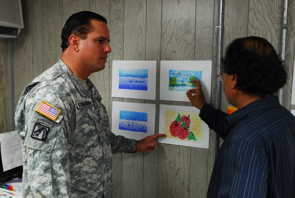 Guantanamo officer in charge views detainee art work