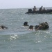 Catching the Surf; Recon Marines Helo-cast Into Open Water, Swim to Shore