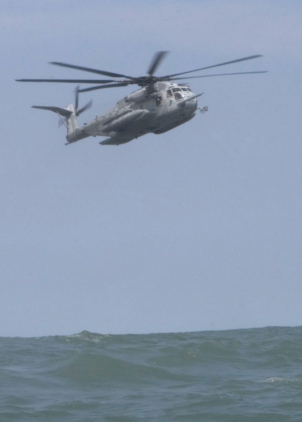 Catching the Surf; Recon Marines Helo-cast Into Open Water, Swim to Shore