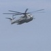Catching the Surf; Recon Marines Helo-cast Into Open Water, Swim to Shore