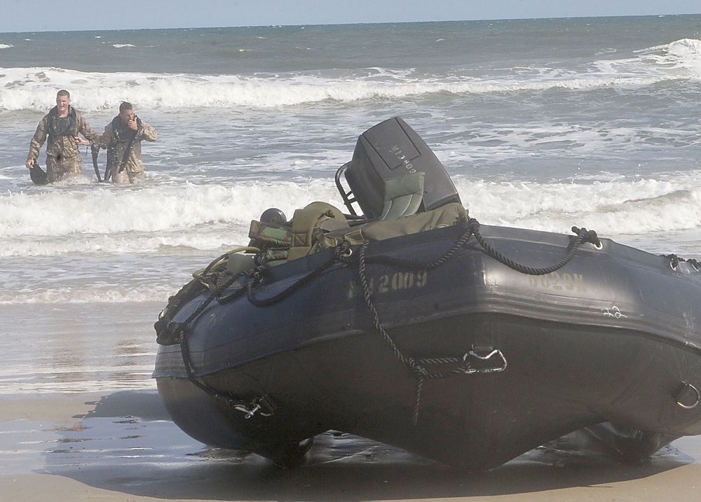 Catching the Surf; Recon Marines Helo-cast Into Open Water, Swim to Shore