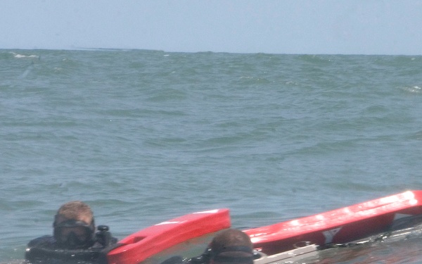 Catching the Surf; Recon Marines Helo-cast Into Open Water, Swim to Shore