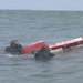 Catching the Surf; Recon Marines Helo-cast Into Open Water, Swim to Shore