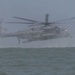 Catching the Surf; Recon Marines Helo-cast Into Open Water, Swim to Shore