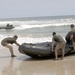 Catching the Surf; Recon Marines Helo-cast Into Open Water, Swim to Shore