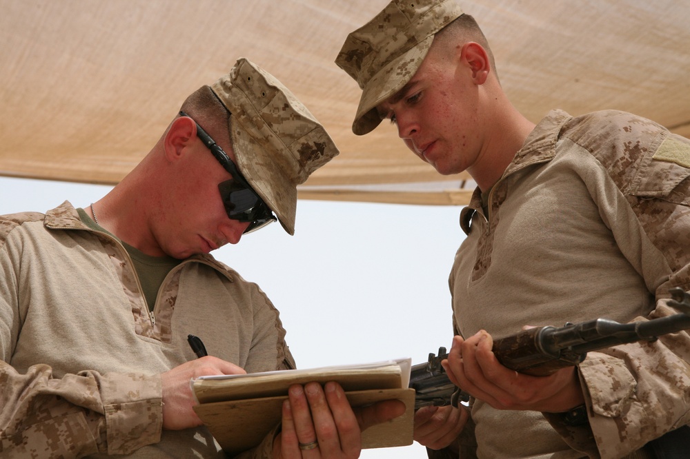 Marines deliver captured weapons to Iraqi forces