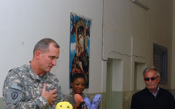 Soldiers Deliver Nainoa Dolls to Orphanage