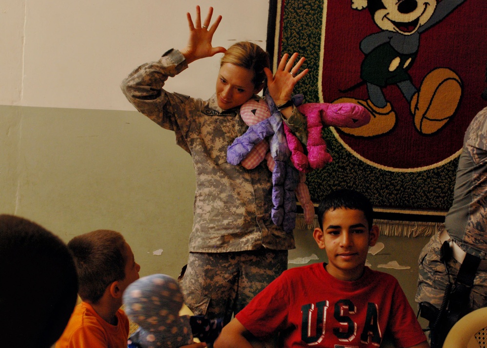 Soldiers Deliver Nainoa Dolls to Orphanage