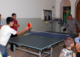 Soldiers Deliver Nainoa Dolls to Orphanage