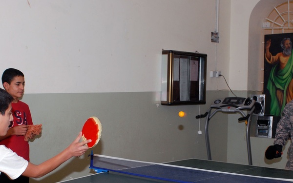 Soldiers Deliver Nainoa Dolls to Orphanage