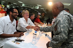 Basketball Coaches Travel Overseas to Say 'thanks'