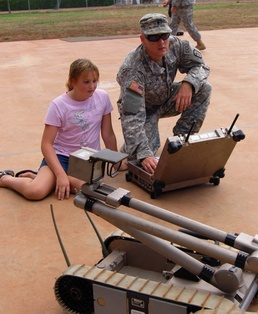 Dxplosive ordnance disposal Soldiers Show Off Skills to Students