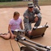 Dxplosive ordnance disposal Soldiers Show Off Skills to Students