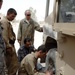 Greywolf mechanics share tricks of the trade with Iraqi Police counterparts