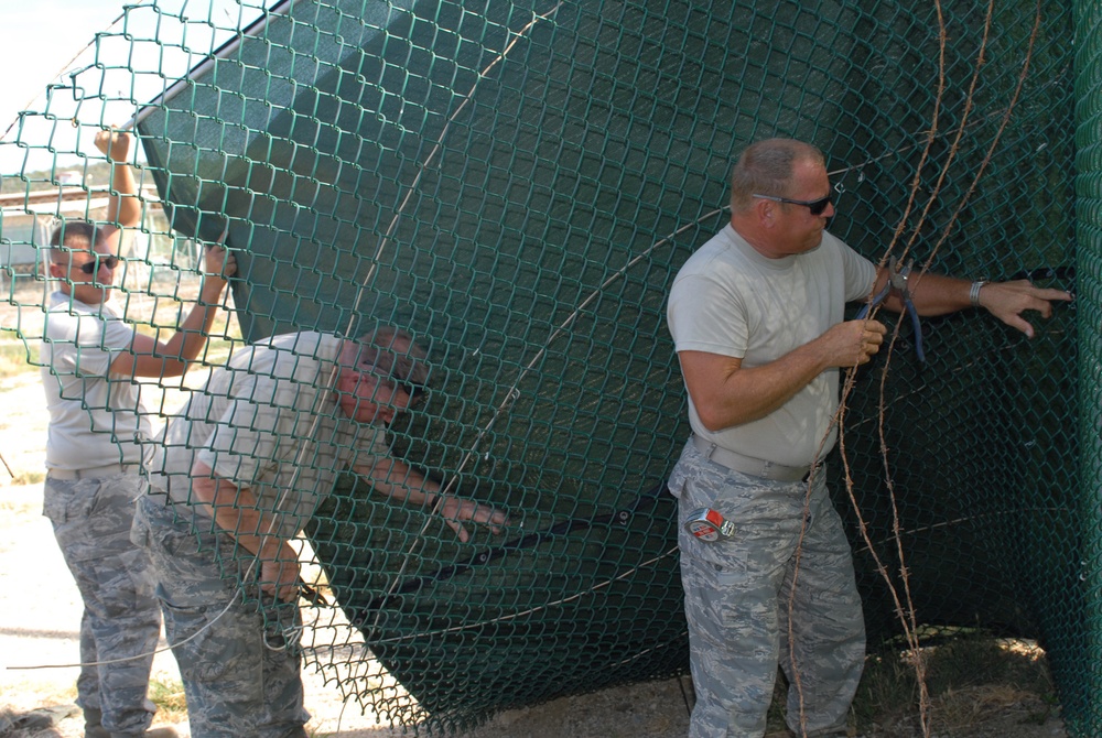 Service members enhance Gitmo fence