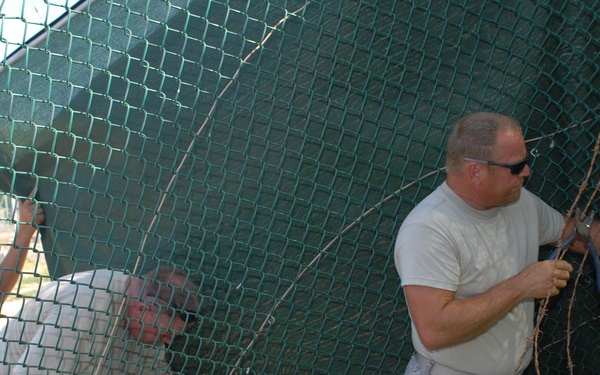 Service members enhance Gitmo fence