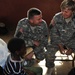 Service members give medical aid during MEDFLAG '09