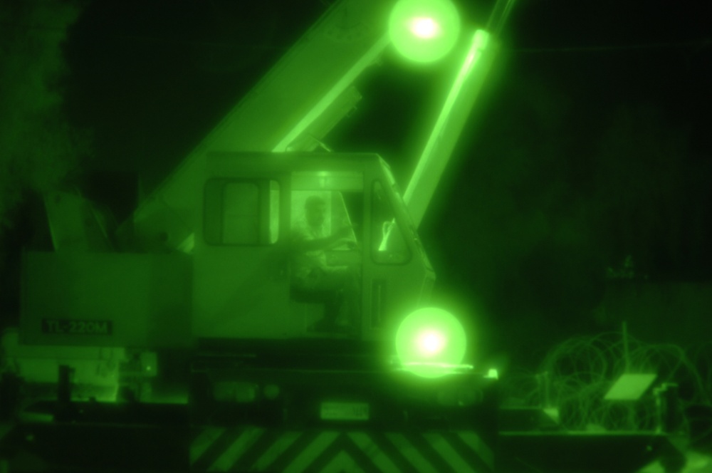 U.S. troops lift Humvee from hole