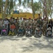 U.S. Soldiers, civilians deliver wheelchairs to Iraqi children in need.