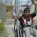 U.S. Soldiers, civilians deliver wheelchairs to Iraqi children in need.