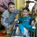 U.S. Soldiers, civilians deliver wheelchairs to Iraqi children in need.