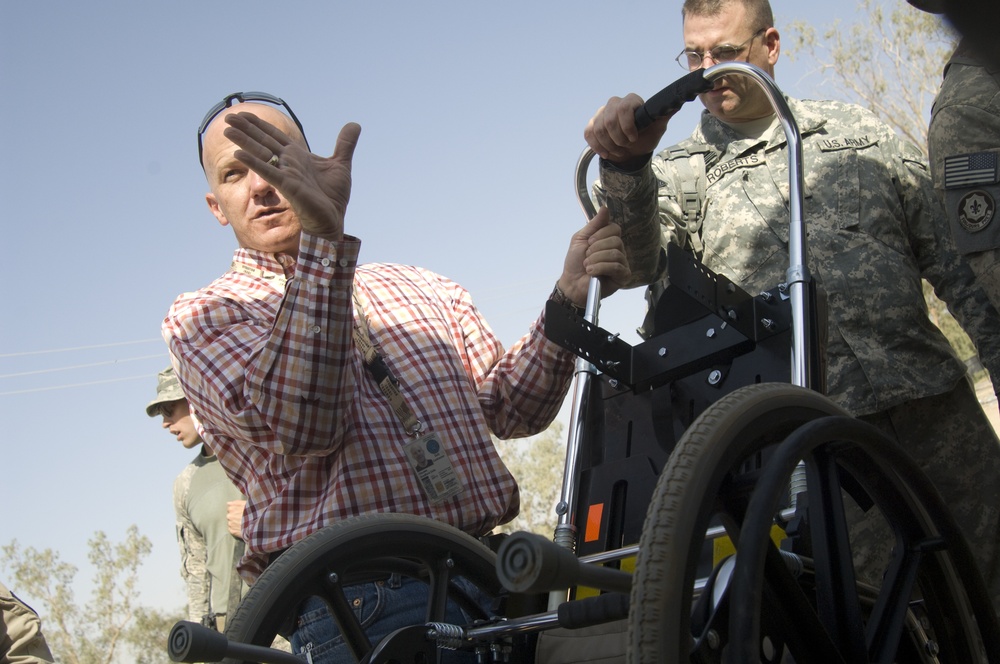 U.S. Soldiers, civilians deliver wheelchairs to Iraqi children in need.