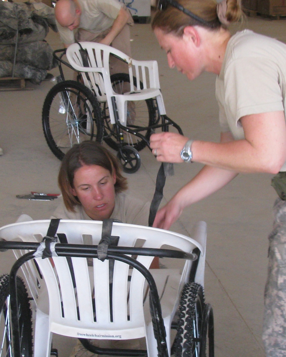 Military Police Assist With Wheelchair Mission
