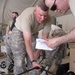 Military Police Assist With Wheelchair Mission