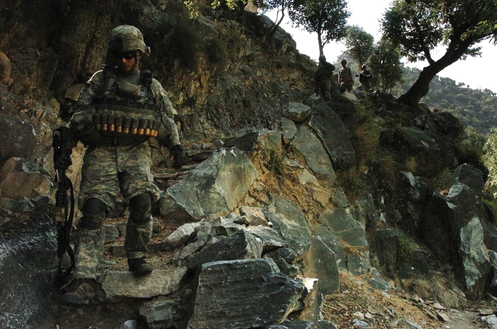 Baker Company Soldiers patrol Korengal Valley