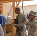 Soldiers work with local nationals