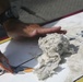 Scraping off wax