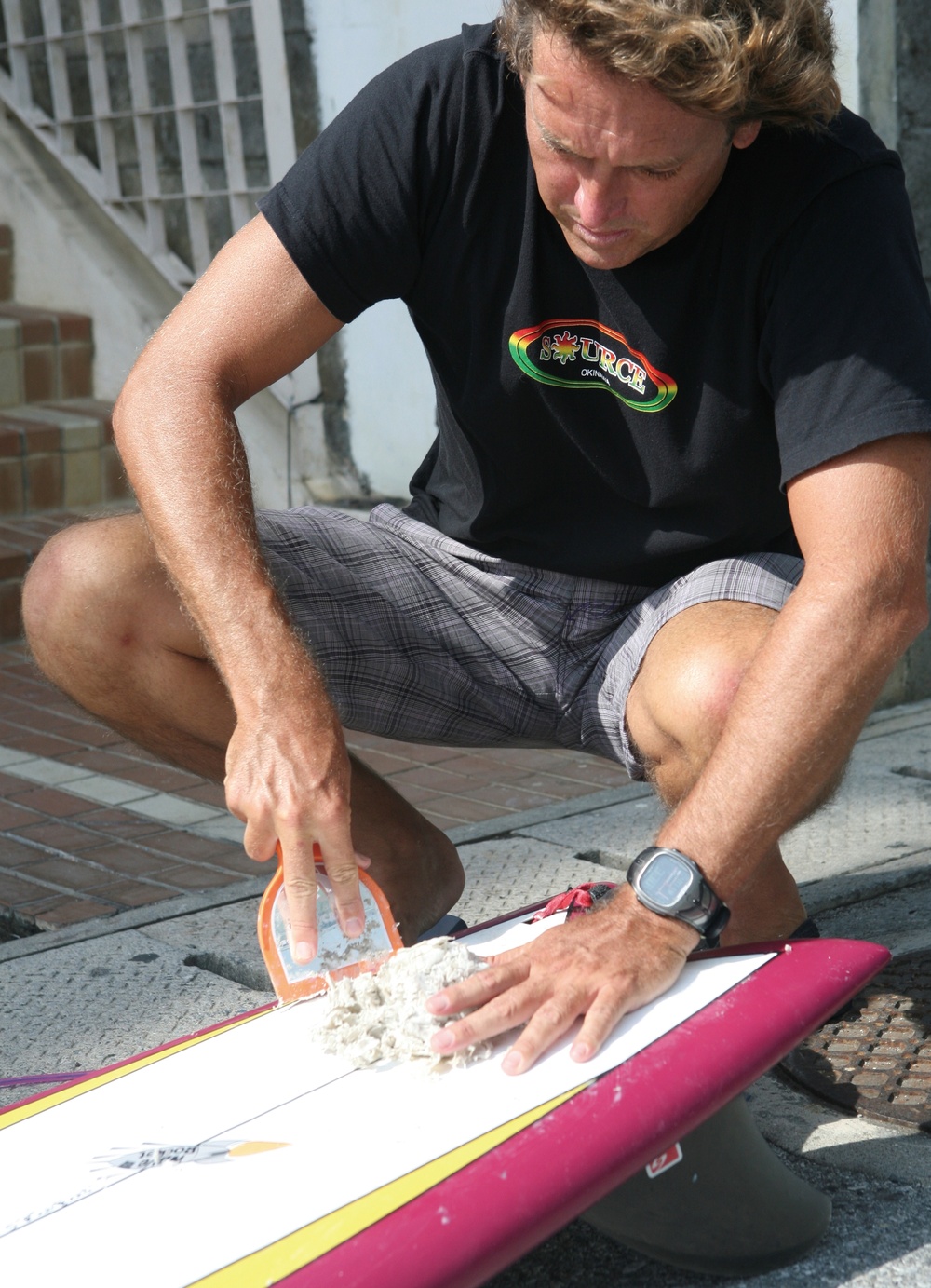 Scraping off wax