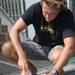 Scraping off wax