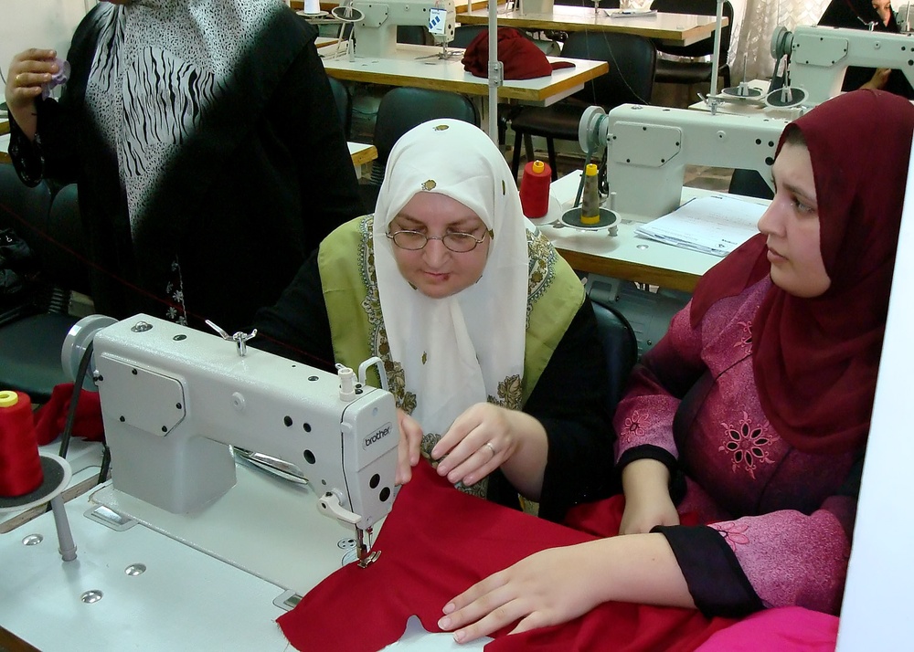 Iraqis learn computer, sewing skills