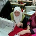 Iraqis learn computer, sewing skills
