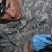 Soldier receives medical aid at Joint Security Station War Eagle