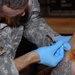 Soldier receives medical aid at Joint Security Station War Eagle