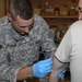 Soldier receives medical aid at Joint Security Station War Eagle