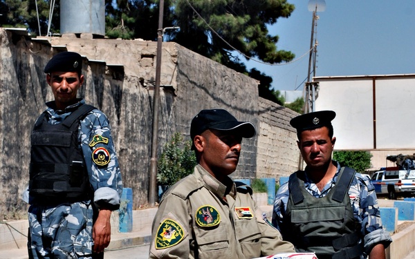 Soldiers Deliver Dog Food to IP Kennel