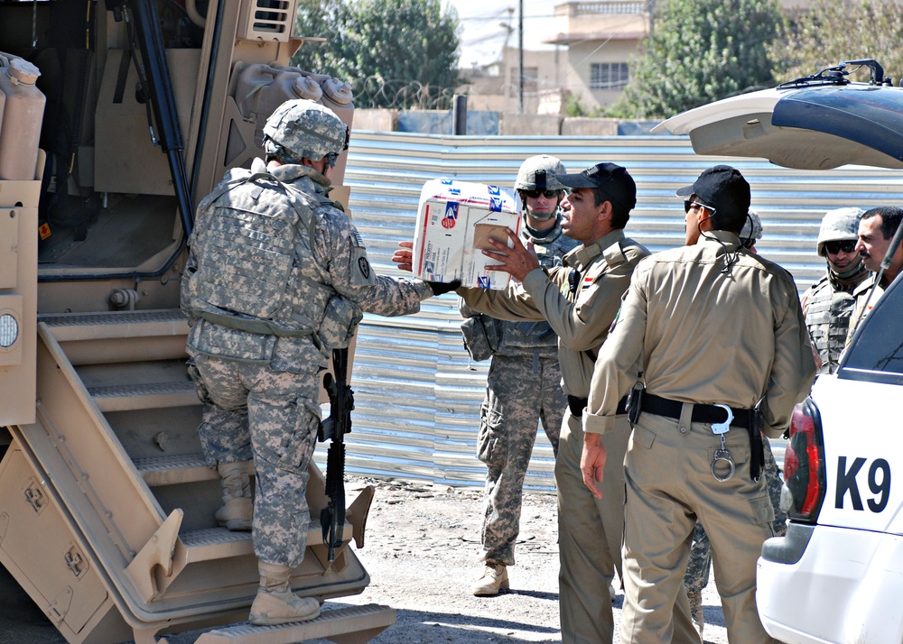 Soldiers Deliver Dog Food to IP Kennel