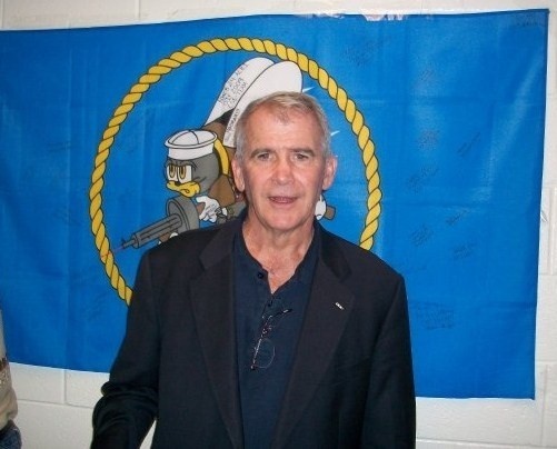 Lt. Col. Oliver North Receives Seabee Flag from NMCB 24 Personnel in Iraq