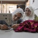 Iraqi women learn sewing