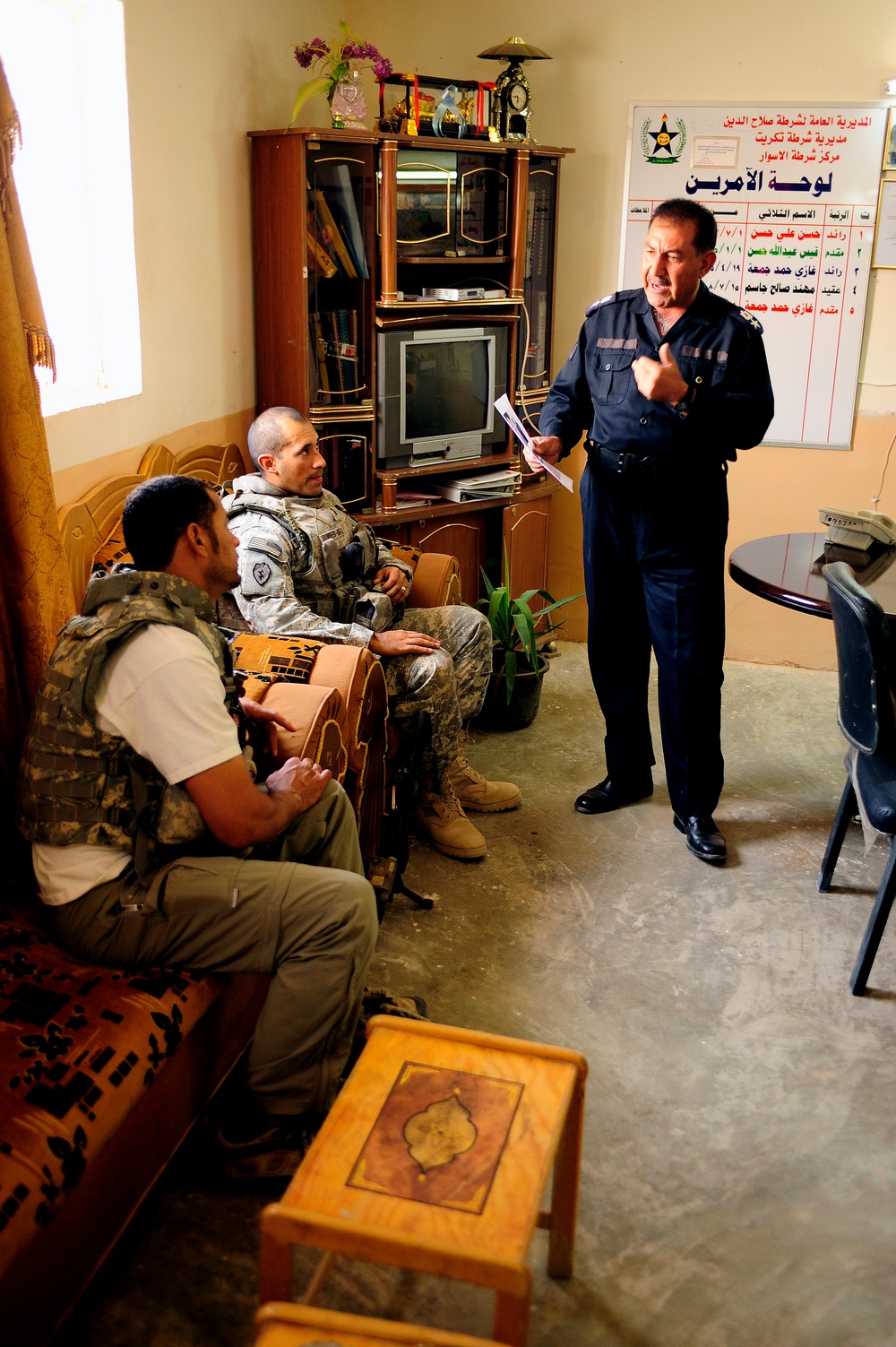 Soldiers visit Iraqi police during micro-grant survey