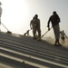 Iraqis insulate buildings to save on energy costs