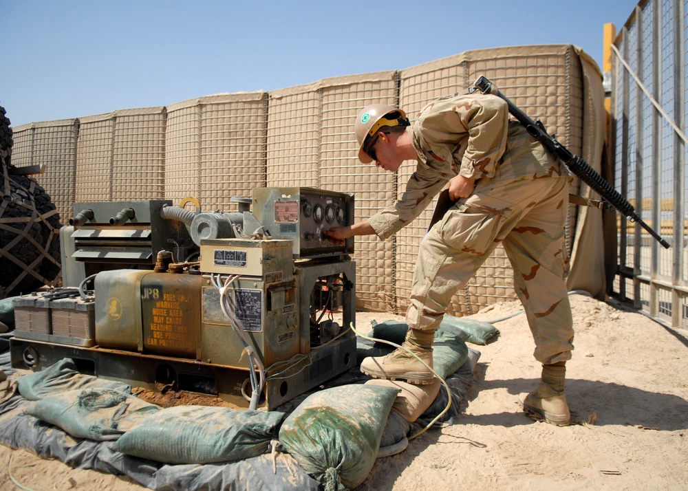 NMCB-74 Camp Maintenance Monitors Generators at Camp Natasha