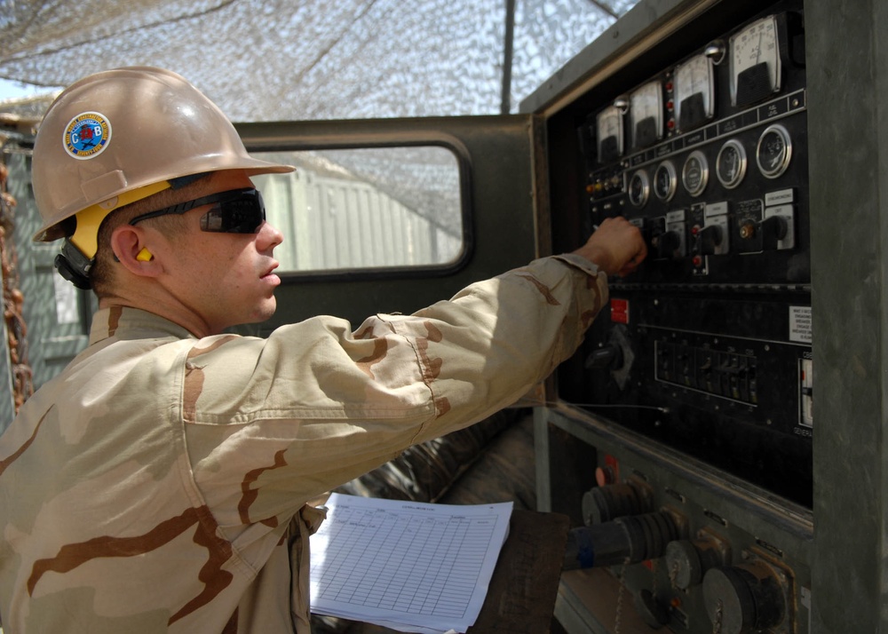 NMCB-74 Camp Maintenance Monitors Generators at Camp Natasha