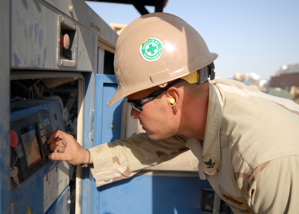 NMCB-74 Camp Maintenance Monitors Generators at Camp Natasha